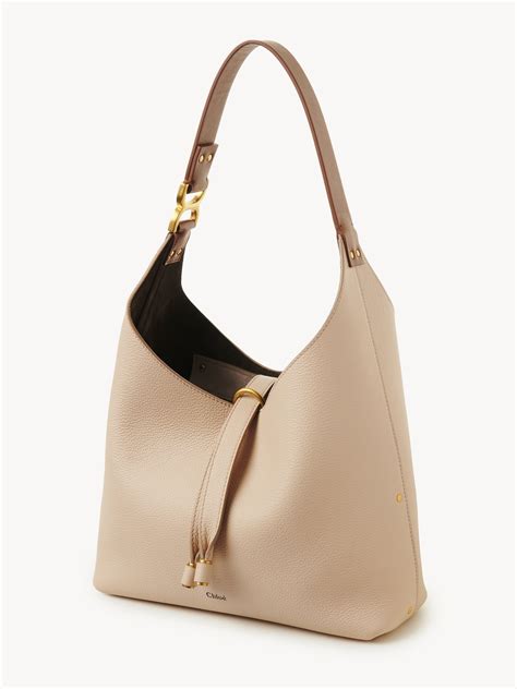 Small Marcie hobo bag in grained leather 